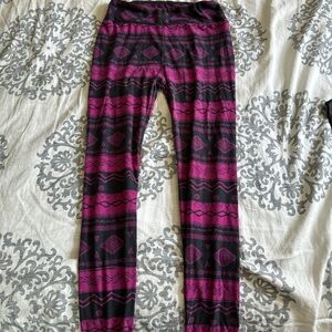 Lularoe Purple and black patterned leggings. So soft and comfortable!